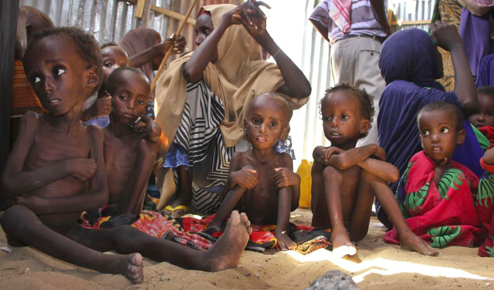 FILE - Malnourished and displaced Somali children sit in a tent in their camp on the outskirts of Mogadishu, Somalia, May 25, 2017.